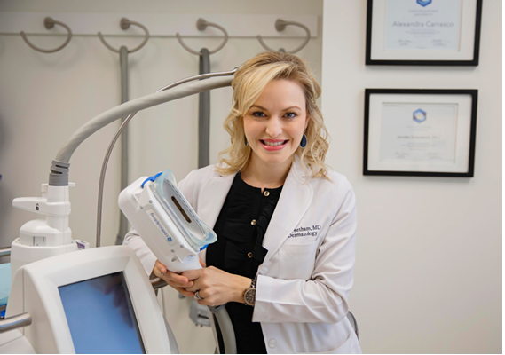 Dr. Feetham using a CoolSculpting device